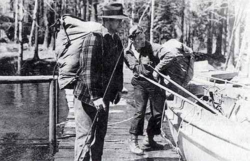 Fishermen getting in to a motor launch on Basswood Lake, 1938. Photo courtesy Minnesota Historical Society