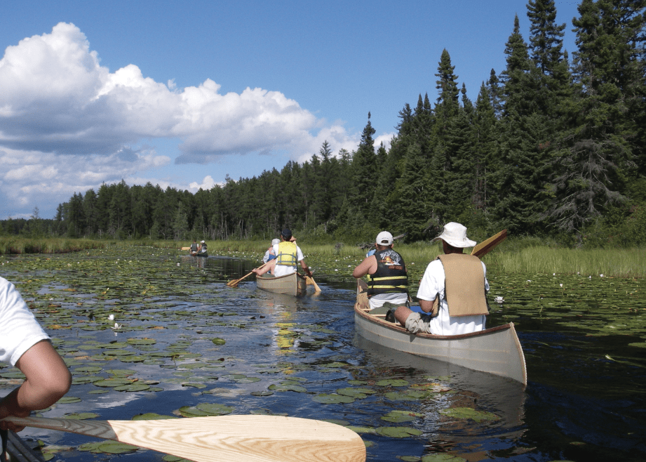 UBB skin-on-frame canoes headed from Kawishiwi to Square Lake in the BWCAW. 