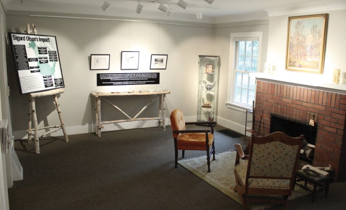  The living room has been adapted to display information about Sigurd Olson’s books and conservation work, as well as a nice spot to read one of his books.