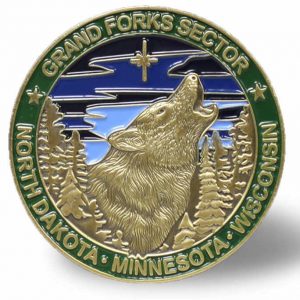 A "Challenge Coin" for the U.S. Border Patrol's sector which includes the BWCAW features a wolf.