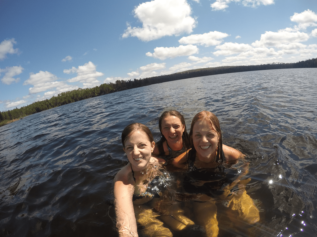 Teen essay contest winner Julia Ruelle swims in the BWCAW with her mom and sister. Photo courtesy Julia Ruelle.