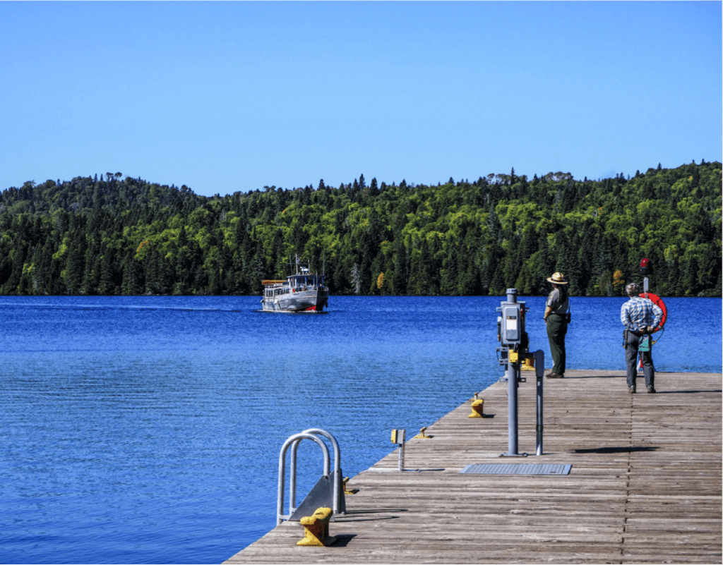 A boat comes in to the Windigo dock on Isle Royale (NPS photo)
