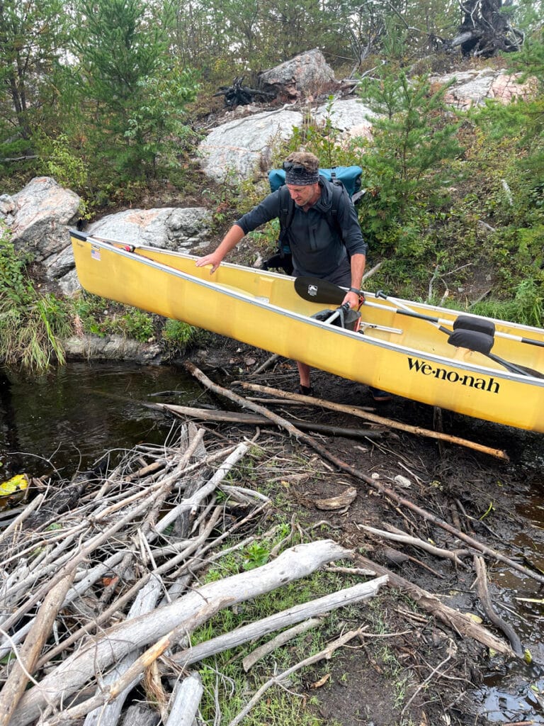 Portaging a canoe in the Boundary Waters.