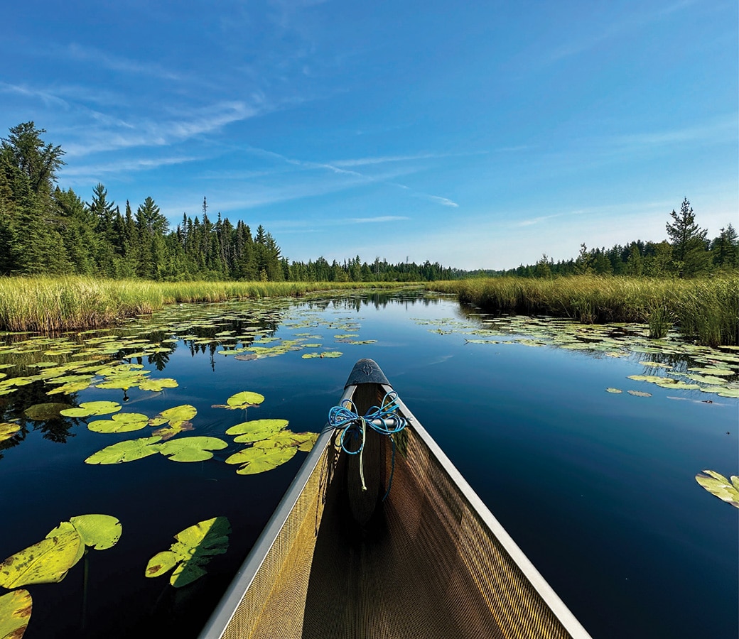BWCAW Canoe Trip stunning blue lake seen from a canoe