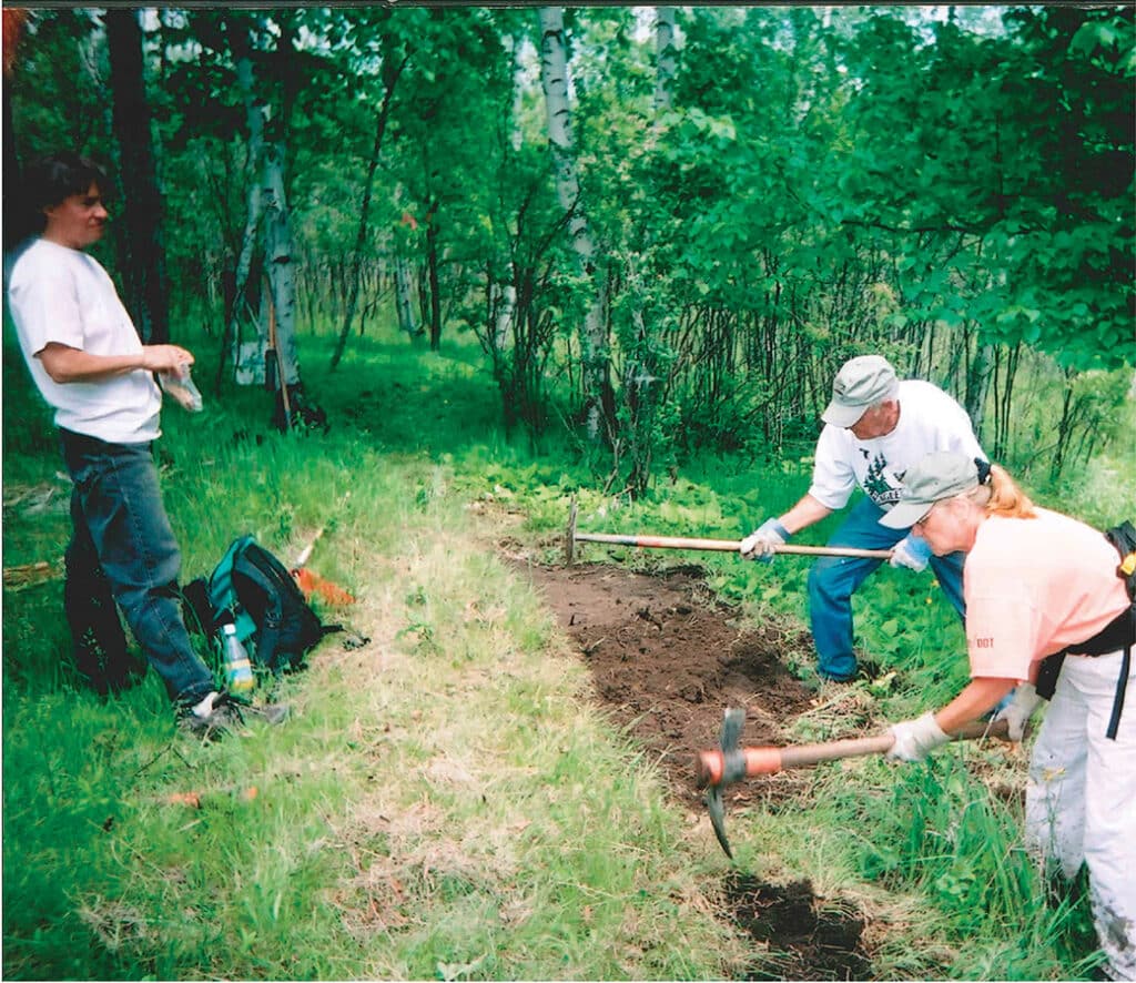 Historical Photo of people working on Superior Hiking Trail